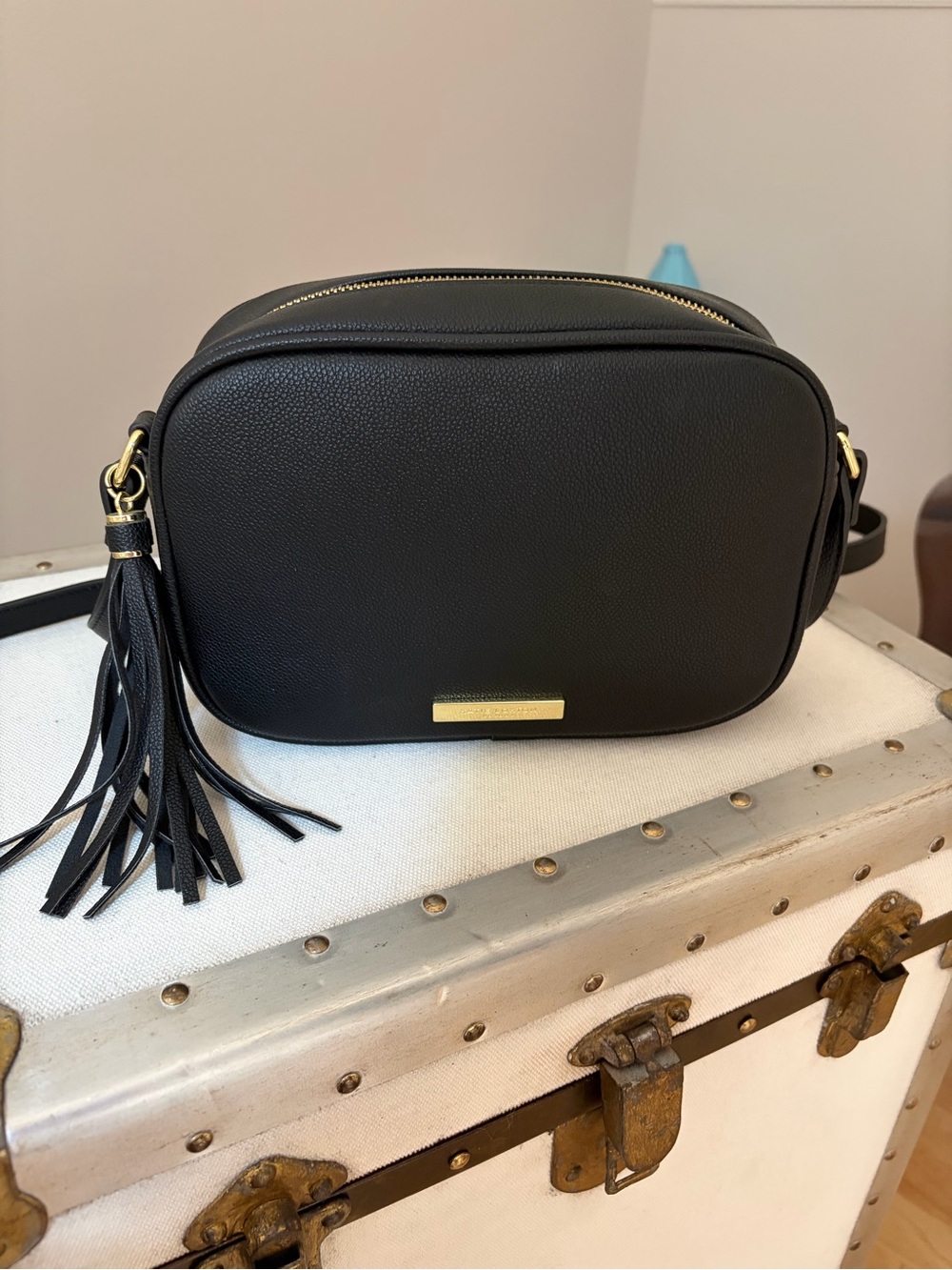 Katie Loxton Classic Black Crossbody Bag with Gold colored hardware.